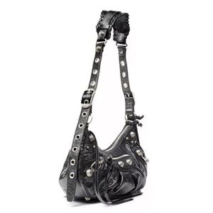 Balenciaga Cagole XS purse.